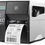 TT Printer ZT230; 203 dpi, US Cord, Serial, USB, Cutter with Catch Tray ZEB-ZT23142-T21000FZ